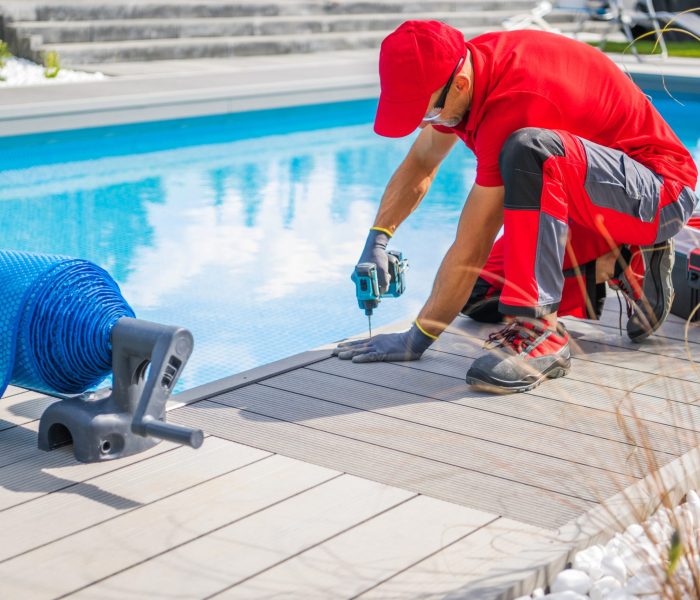 Professional,Swimming,Pools,Worker,Finishing,Composite,Outdoor,Pool,Deck,Installation.